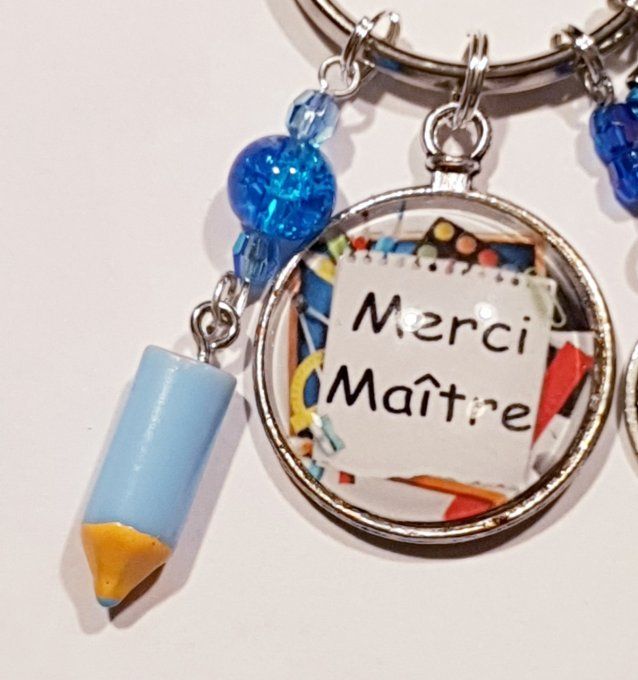 Porte clefs 'Merci maitre' en bleu