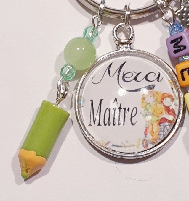 Porte clefs " Merci maitre "