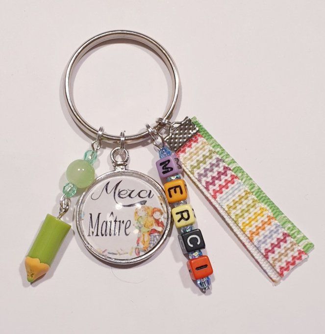 Porte clefs " Merci maitre "