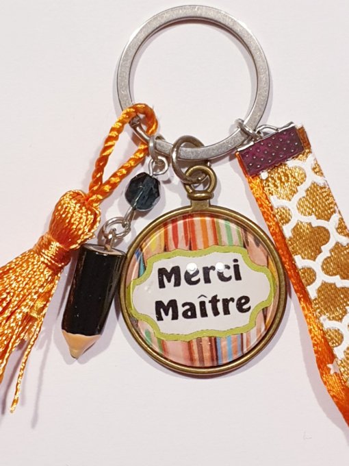 grigri, porte clef Merci maitre